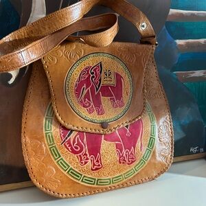 Artisan Leather Shoulder Bag with Elephant Motif